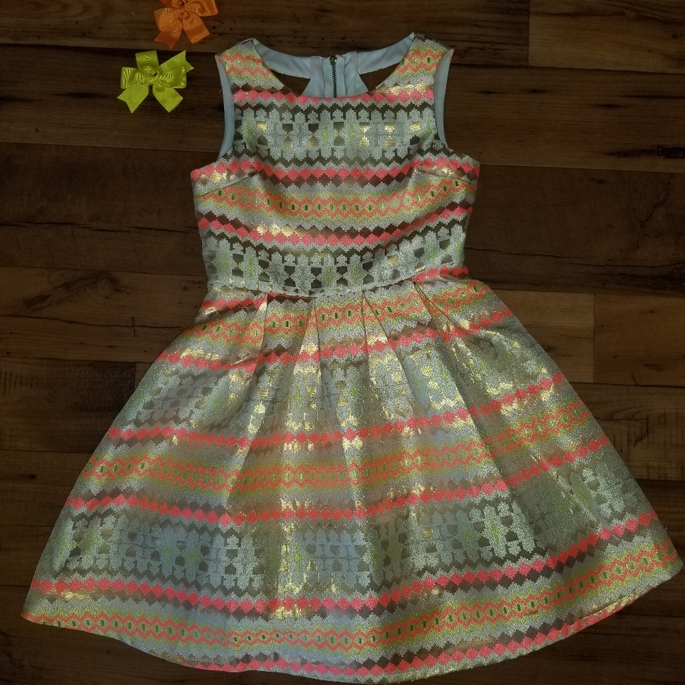 Gold, orange, dark orange, yellow and cream dress